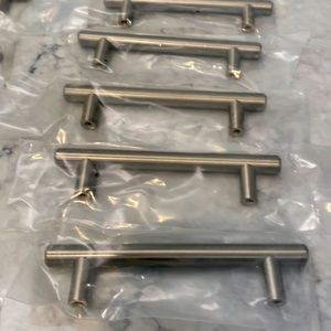 Heavy weight brushed nickel cabinet pulls. New in package.